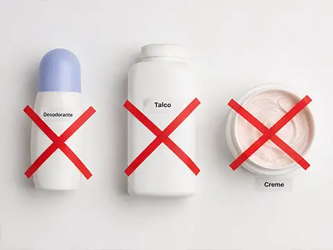 Desodorante, talco e creme marcados com X, itens a evitar no dia do exame